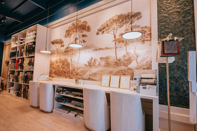 Textured natural-fiber wallcoverings on the sample wall